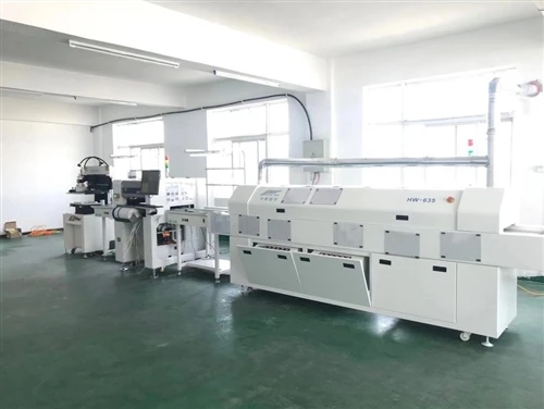 SMT production line with solder paste printer and reflow oven